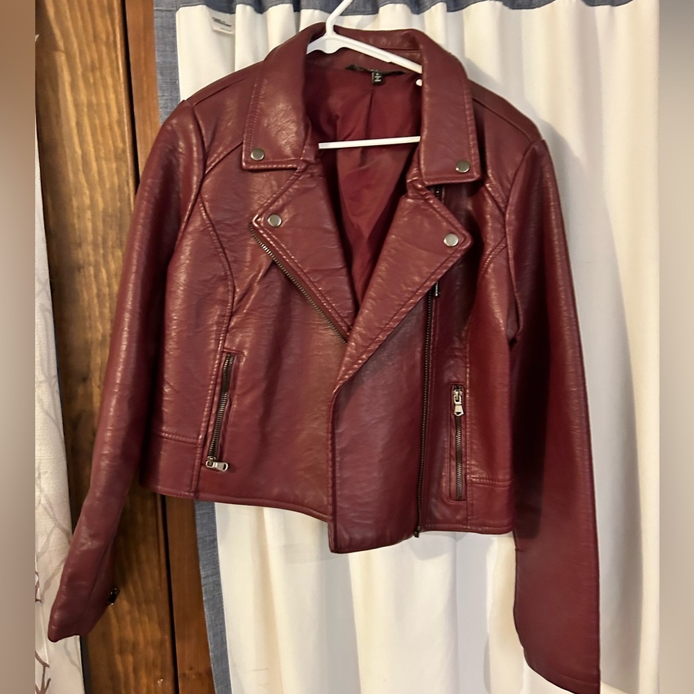 Red buckle faux leather jacket
